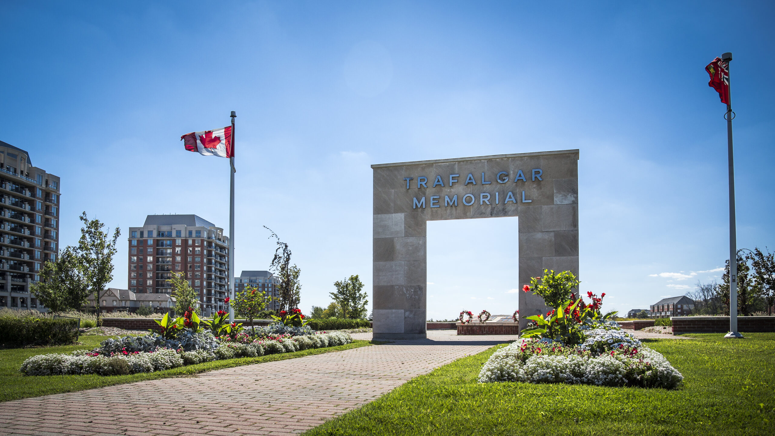 Gateway feature near Uptown Core Oakville on a sunny day