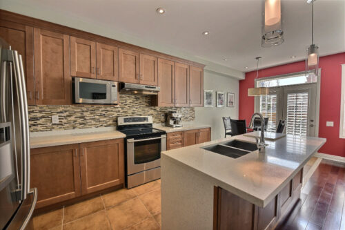 Kitchen with island in three bedroom townhouse for lease Bronte Oakville