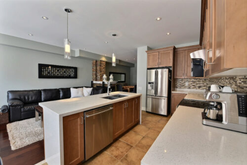 Quartz kitchen with island in townhouse for lease Bronte Oakville