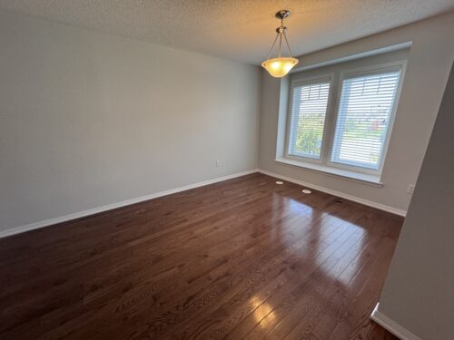 Dining area with hardwood floors and pendant light, 829 Fowles Court, Hawthorne Village, Milton