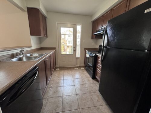 Kitchen with double sink and tile flooring, 829 Fowles Court, Hawthorne Village, Milton