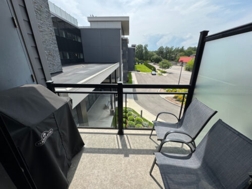 Private balcony with a gas BBQ overlooking the courtyard, Suite 319, Windows on the Green, Erin Mills, Mississauga