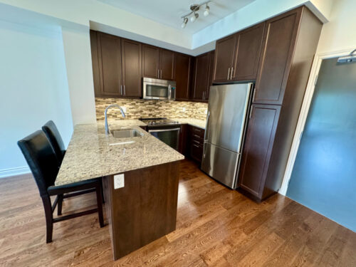 Kitchen island with breakfast-bar seating, Suite 319, Windows on the Green, Erin Mills, Mississauga