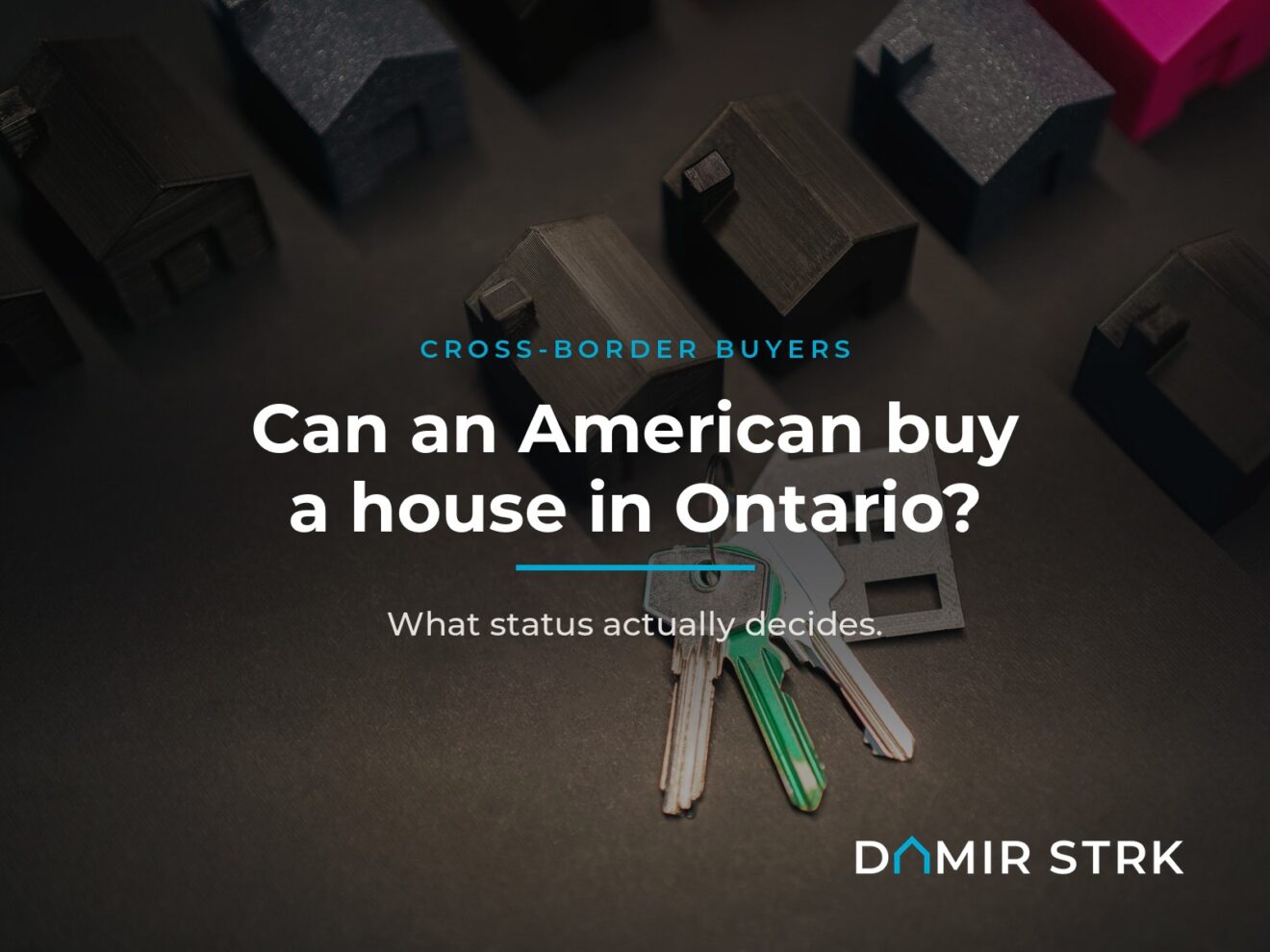 House keys with a house-shaped keychain among model homes, illustrating buying a home in Ontario