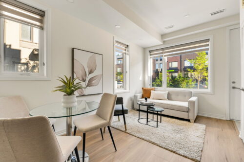 living and dining area with windows on two sides william duncan road downsview park toronto