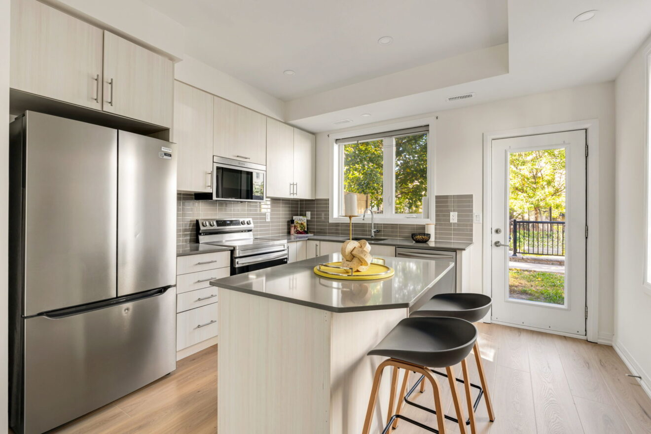 kitchen with brand new stainless fridge stove and dishwasher william duncan road downsview park toronto