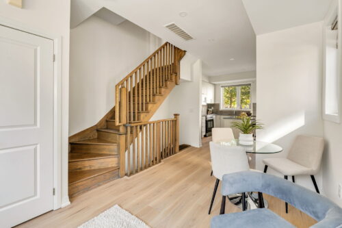 wooden staircase beside the dining area william duncan road downsview park toronto