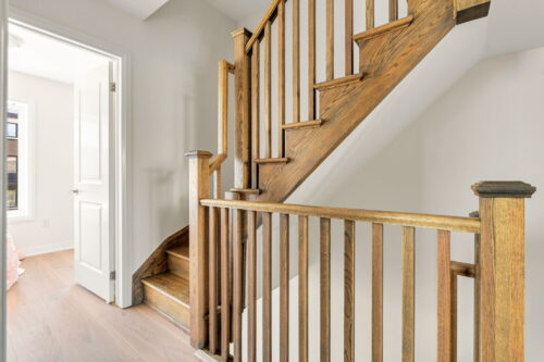 wooden staircase upper level william duncan road downsview park toronto