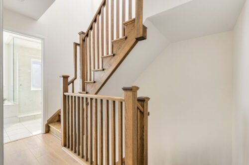 wooden staircase and bathroom doorway william duncan road downsview park toronto