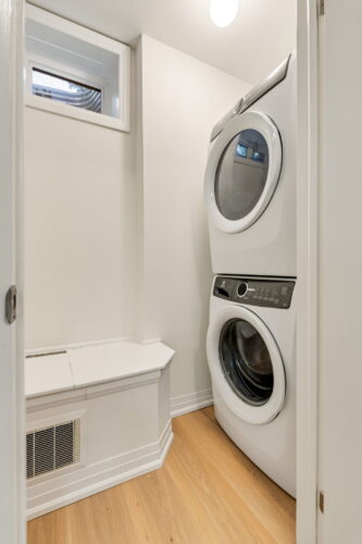 laundry with stacked washer and dryer william duncan road downsview park toronto